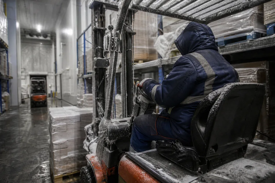 Cold storage warehouse with tall racking, a workers compensation account